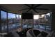 Living room featuring stunning city views from floor-to-ceiling windows at 285 Centennial Olympic Park Dr # 1705, Atlanta, GA 30313