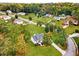 Aerial view of the home showcasing the surrounding landscape of mature trees and neighborhood setting at 5077 Fieldview Dr, Douglasville, GA 30135