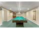 Basement featuring billiards room with pool table and wet bar, perfect for entertaining at 5077 Fieldview Dr, Douglasville, GA 30135