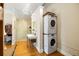 Bathroom featuring a marble-tiled shower, sleek vanity, stacked washer and dryer at 794 Ralph Mcgill Ne Blvd # 8, Atlanta, GA 30312