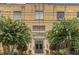 Beautiful building entrance featuring the NuGrape name, potted plants, and trees for a grand entryway at 794 Ralph Mcgill Ne Blvd # 8, Atlanta, GA 30312