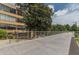 Exterior shot of the building beside a walking path and trees offering a mix of urban and green spaces at 794 Ralph Mcgill Ne Blvd # 8, Atlanta, GA 30312