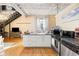 Well-lit kitchen featuring an island with bar seating and stainless steel appliances at 794 Ralph Mcgill Ne Blvd # 8, Atlanta, GA 30312