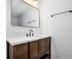 Updated bathroom featuring a dark wood vanity, white countertop, and modern fixtures at 2215 Gordon Se Cir, Smyrna, GA 30080