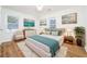 Bright bedroom with neutral walls and wood laminate flooring at 2215 Gordon Se Cir, Smyrna, GA 30080