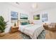 Bright bedroom with neutral walls and wood laminate flooring at 2215 Gordon Se Cir, Smyrna, GA 30080