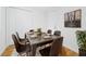 Well-lit dining area with modern table set, neutral tones, and natural light streaming in at 2215 Gordon Se Cir, Smyrna, GA 30080