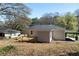 Exterior home view with a deck, siding, and car port at 2215 Gordon Se Cir, Smyrna, GA 30080