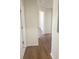 Bright hallway features updated trim, hardwood floors, and white walls at 2215 Gordon Se Cir, Smyrna, GA 30080