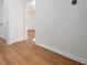 Hardwood floor and white trim are seen from the vantage point of the hallway at 2215 Gordon Se Cir, Smyrna, GA 30080