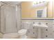 Tiled bathroom featuring a shower, toilet, sink, and neutral color scheme at 4142 Huntcliff Dr, Woodstock, GA 30189