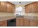 Kitchen featuring wood cabinets, countertops, and stainless steel appliances at 4142 Huntcliff Dr, Woodstock, GA 30189