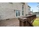 Elevated deck overlooking the backyard, attached to a brick home with white trim at 1536 Granby Ln, Locust Grove, GA 30248