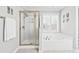 Bathroom features a shower with glass doors and a large soaking tub with jets at 3811 Lavilla Dr, Powder Springs, GA 30127