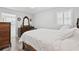 Bedroom with hardwood floors and dark wood dresser at 3811 Lavilla Dr, Powder Springs, GA 30127
