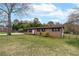 Attractive single-story brick home with a well-maintained front lawn at 3811 Lavilla Dr, Powder Springs, GA 30127