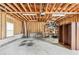View of the unfinished garage interior showing the 2-car white door at 3811 Lavilla Dr, Powder Springs, GA 30127