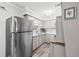 Well-lit kitchen with modern appliances and sleek countertops at 3811 Lavilla Dr, Powder Springs, GA 30127