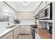 Efficient kitchen layout with updated appliances and ample cabinet space at 3811 Lavilla Dr, Powder Springs, GA 30127