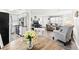Open-concept living space with eat-in kitchen and hardwood floors at 3811 Lavilla Dr, Powder Springs, GA 30127