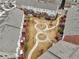 Aerial view showcases the layout of the townhome units, common area, and walking paths at 4125 Barry Pl, Chamblee, GA 30341