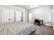 Comfortable bedroom featuring neutral tones, carpet, and a work desk at 4125 Barry Pl, Chamblee, GA 30341