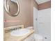 Bathroom with a white vanity, sink, a new shower and toilet at 6347 Steepleridge Ct, Riverdale, GA 30296
