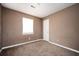 Bedroom features carpet, neutral-toned walls, and good natural lighting at 6347 Steepleridge Ct, Riverdale, GA 30296