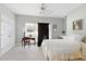 Spacious bedroom featuring neutral walls, carpeted floors, and a large window, creating a peaceful atmosphere at 8005 Sweet Creek Rd, Johns Creek, GA 30097