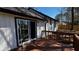 Back deck with wooden planks and views of a large backyard at 309 Peachtree Dr, Riverdale, GA 30274