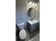 Stylish bathroom with a modern vanity, updated fixtures, and ample counter space at 309 Peachtree Dr, Riverdale, GA 30274