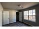 A bedroom with closet and windows features modern flooring at 309 Peachtree Dr, Riverdale, GA 30274