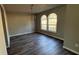 Dining room with chandelier lighting and large windows providing ample natural light at 309 Peachtree Dr, Riverdale, GA 30274