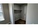 Neutrally painted laundry room with shelving at 309 Peachtree Dr, Riverdale, GA 30274