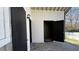 Spacious patio has three black doors offering ample storage space at 309 Peachtree Dr, Riverdale, GA 30274