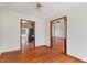 Living room showing hardwood floors and open access to the kitchen at 3966 N Indian Nw Cir, Kennesaw, GA 30144