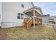 Exterior view of back deck with steps to the backyard, showcasing outdoor living potential at 636 Georgia Way, Woodstock, GA 30188