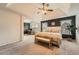 Spacious main bedroom featuring a trey ceiling, neutral carpet, and a dedicated office nook at 636 Georgia Way, Woodstock, GA 30188