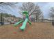 Community playground with colorful slides and play structures, offering a fun space for children at 636 Georgia Way, Woodstock, GA 30188