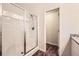 Modern bathroom shower with glass doors, offering a bright and clean space at 636 Georgia Way, Woodstock, GA 30188