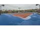 Community tennis courts with lighting and seating, providing an active recreational option at 636 Georgia Way, Woodstock, GA 30188