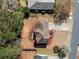 Aerial view of house with large, fenced backyard with mature trees at 924 Evian Nw Dr, Kennesaw, GA 30152