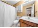 Full bathroom with a shower-tub combination, toilet, vanity with cabinet at 924 Evian Nw Dr, Kennesaw, GA 30152