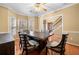Bright dining room with hardwood floors and views to the stairway at 924 Evian Nw Dr, Kennesaw, GA 30152