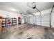 Spacious two-car garage with ample storage and white garage doors at 924 Evian Nw Dr, Kennesaw, GA 30152