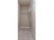 A walk-in closet with carpeted floors and metal shelving at 167 Pinewood Dr, Covington, GA 30014