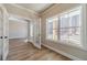 Bright office with hardwood floors, glass french doors, and a large picture window at 167 Pinewood Dr, Covington, GA 30014