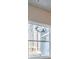 A window with an exterior view, showcasing the backyard at 167 Pinewood Dr, Covington, GA 30014