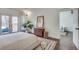 Comfortable bedroom with access to a balcony, hardwood floors and stylish decor at 280 Josephine St, Atlanta, GA 30307