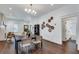 Bright dining room showcases hardwood floors and access to the living room and bathroom at 280 Josephine St, Atlanta, GA 30307